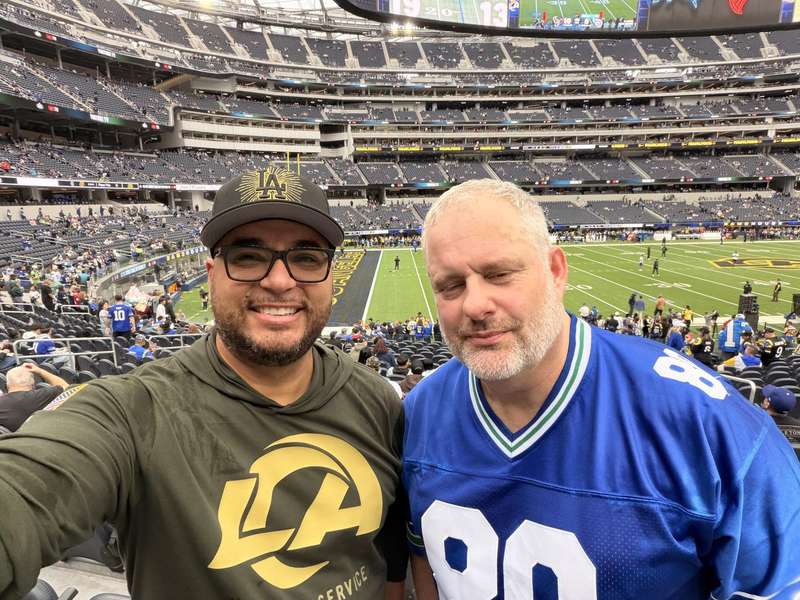 Two fans selfie in the lower bowl