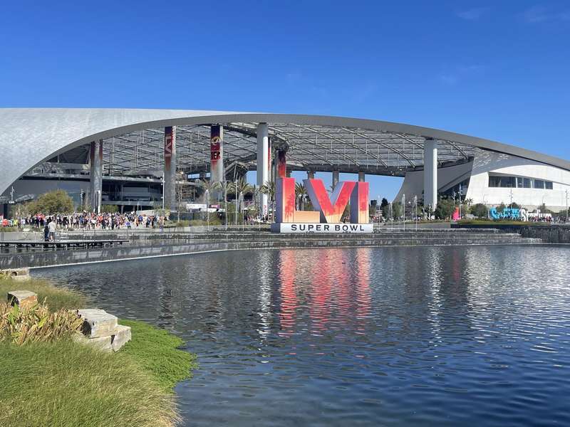 Super Bowl LVI sign reflected in pond
