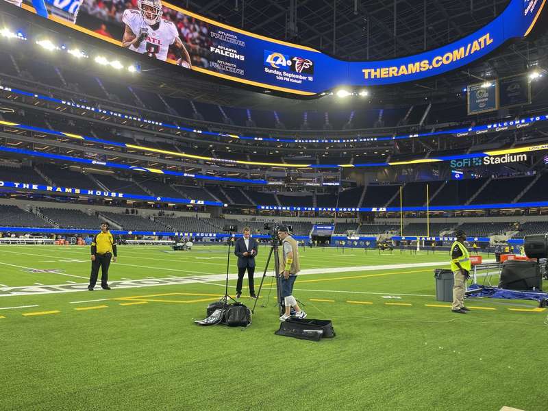 Field level looking up at screen